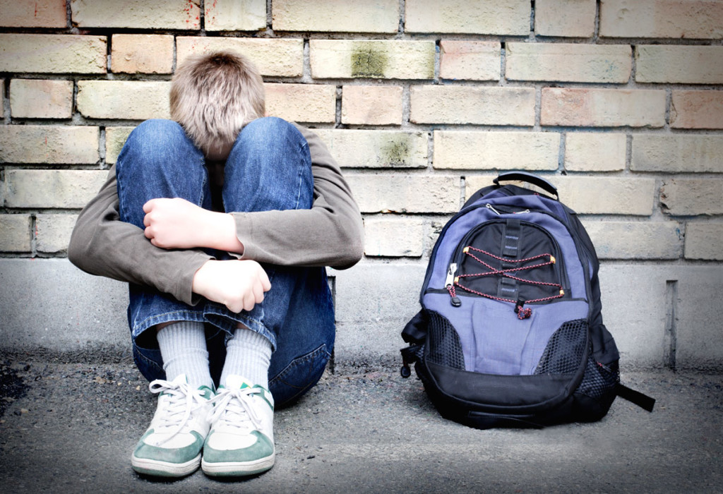 Image of child who has been bullied in school